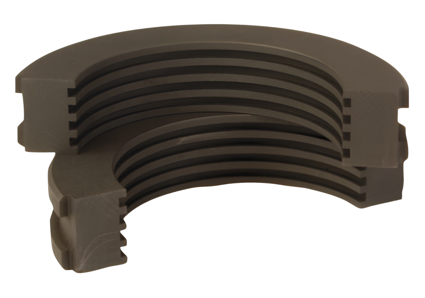 Multi-part segment ring made from carbon material, precisely machined
